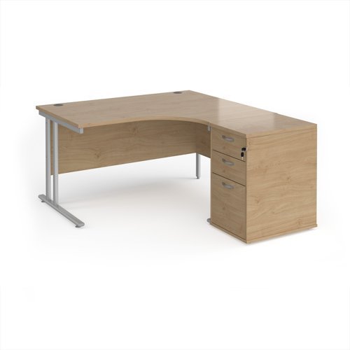 Maestro 25 right hand ergonomic desk 1400mm with silver cantilever frame and desk high pedestal - Kendal Oak - EBS14RKO