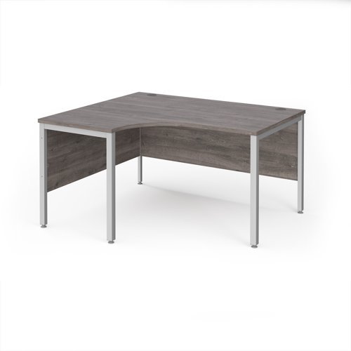 Maestro 25 left hand ergonomic desk 1400mm wide - silver bench leg frame Grey Oak Top - MB14ELSGO