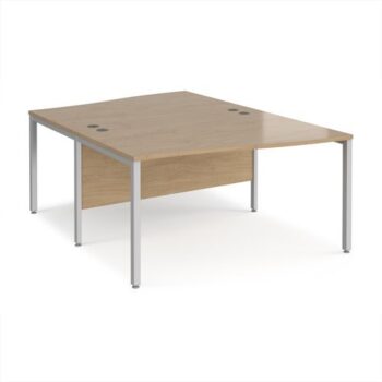 Maestro 25 back to back wave desks 1400mm deep - silver bench leg frame Kendal Oak Top - MB14WBSKO