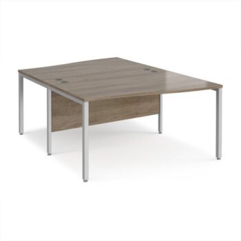 Maestro 25 back to back wave desks 1400mm deep - silver bench leg frame Nebraska Oak Top - MB14WBSNO