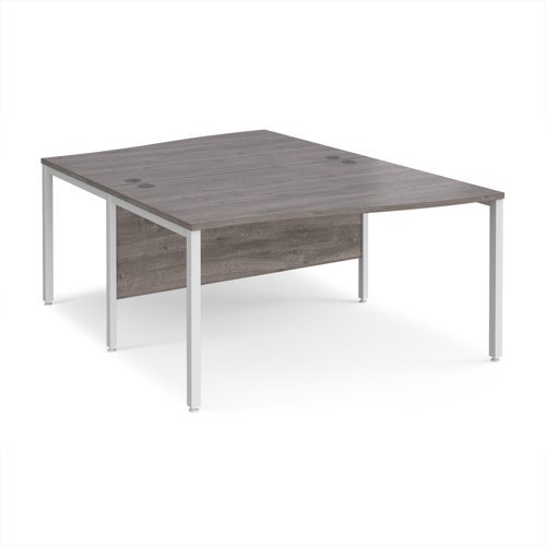 Maestro 25 back to back wave desks 1400mm deep - white bench leg frame Grey Oak Top - MB14WBWHGO