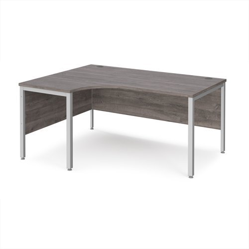 Maestro 25 left hand ergonomic desk 1600mm wide - silver bench leg frame Grey Oak Top - MB16ELSGO