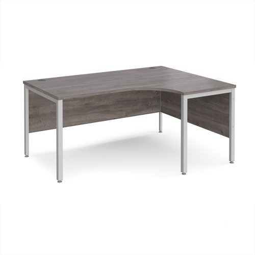 Maestro 25 right hand ergonomic desk 1600mm wide - silver bench leg frame Grey Oak Top - MB16ERSGO