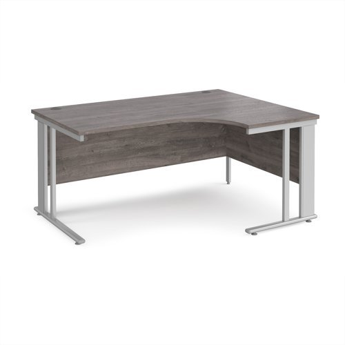 Maestro 25 right hand ergonomic desk 1600mm wide - silver cable managed leg frame Grey Oak Top - MCM16ERSGO